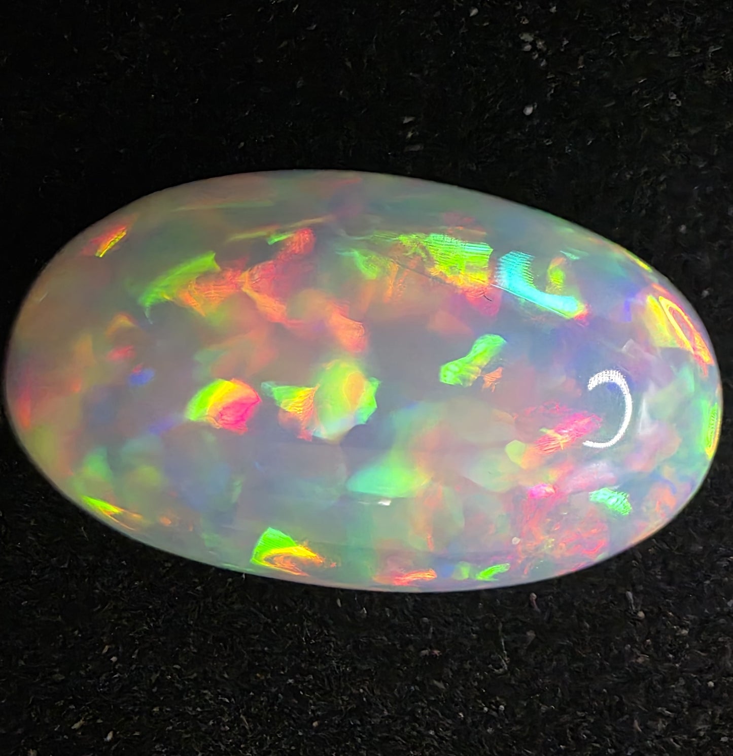 White Opal special Ethiopian Welo, 13.05 ct oval polished, natural, intense Play-of-Colour
