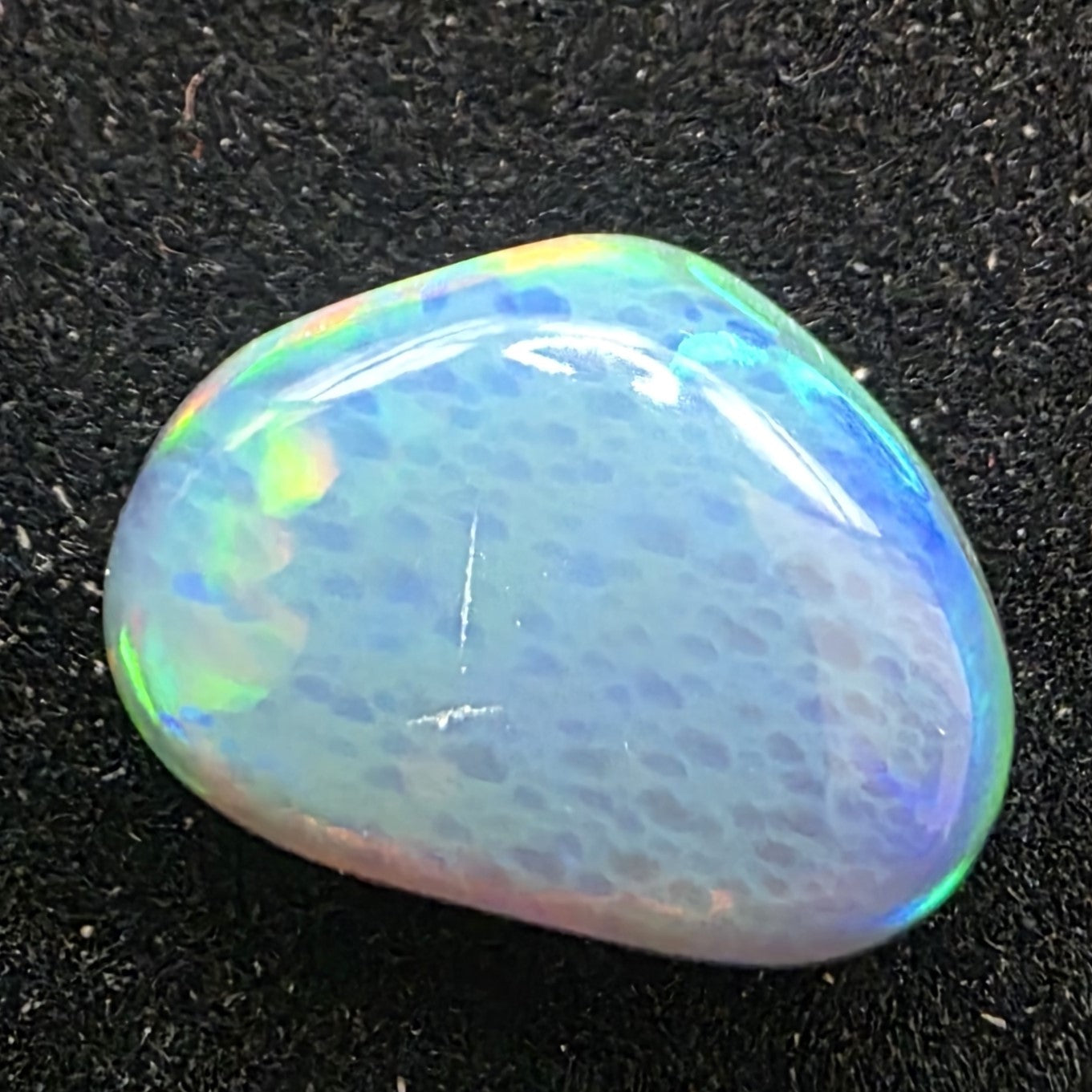 Black Opal special Ethiopian Welo, 4.25 ct freeform polished, natural, intense Play-of-Colour