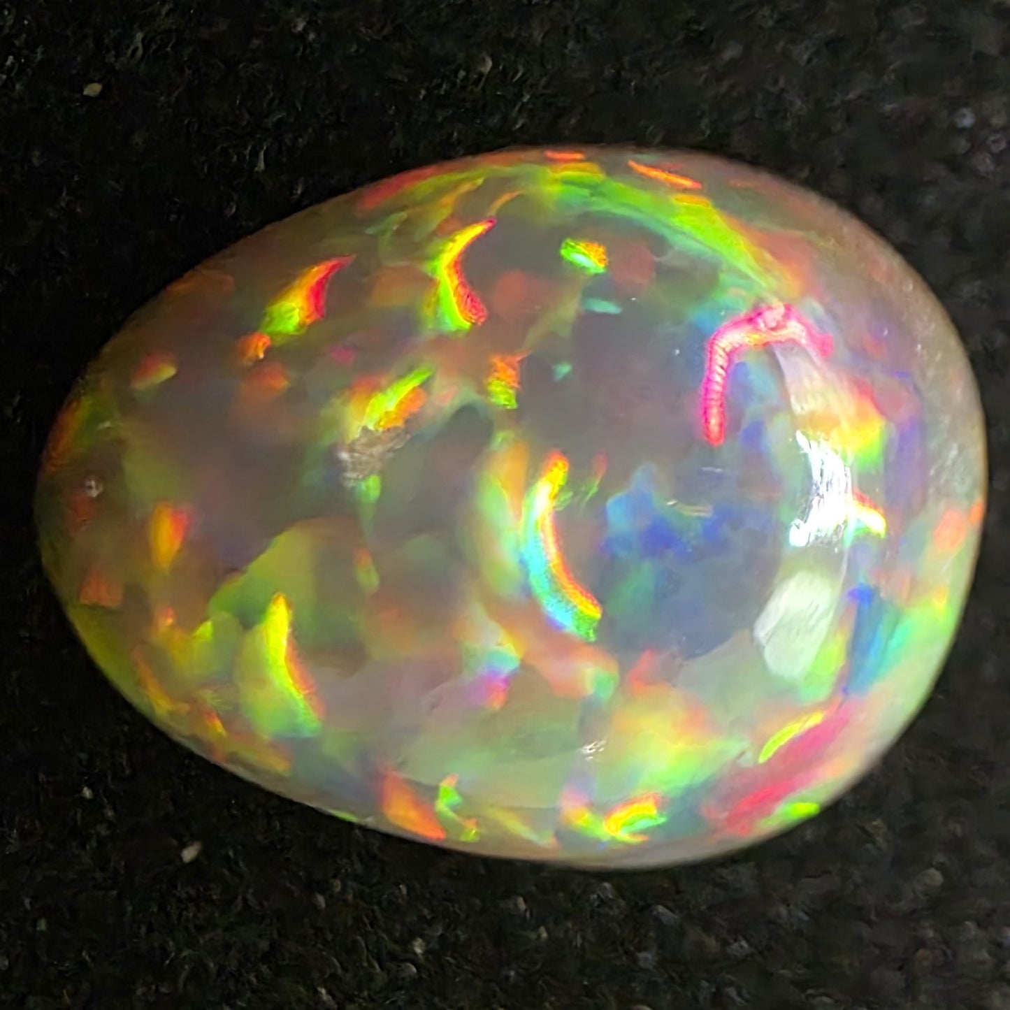 Black Opal special Ethiopian Welo, 6.15 ct pear polished, natural, intense Play-of-Colour