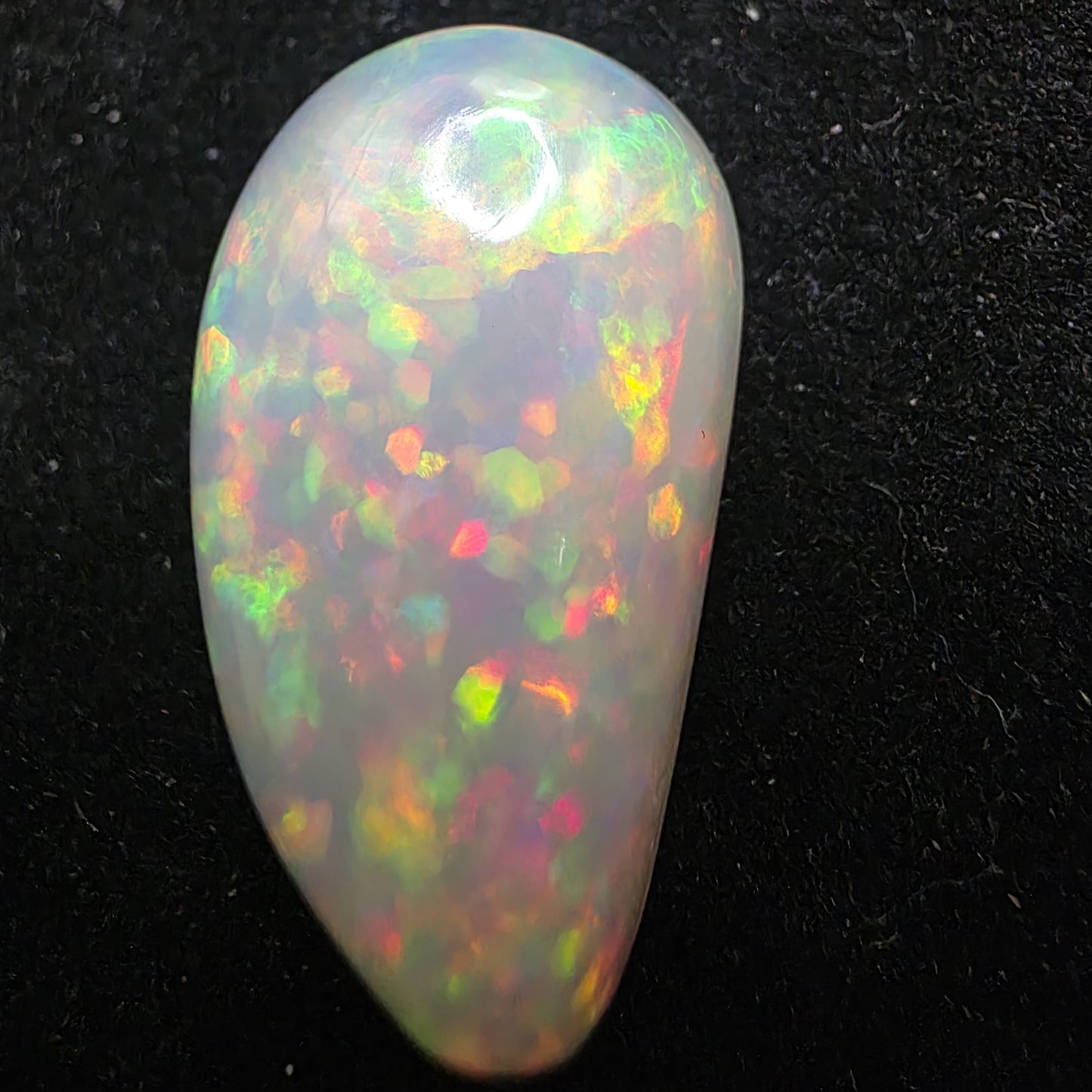 White Opal special Ethiopian Welo, 18.3 ct freeform polished, natural, intense Play-of-Colour