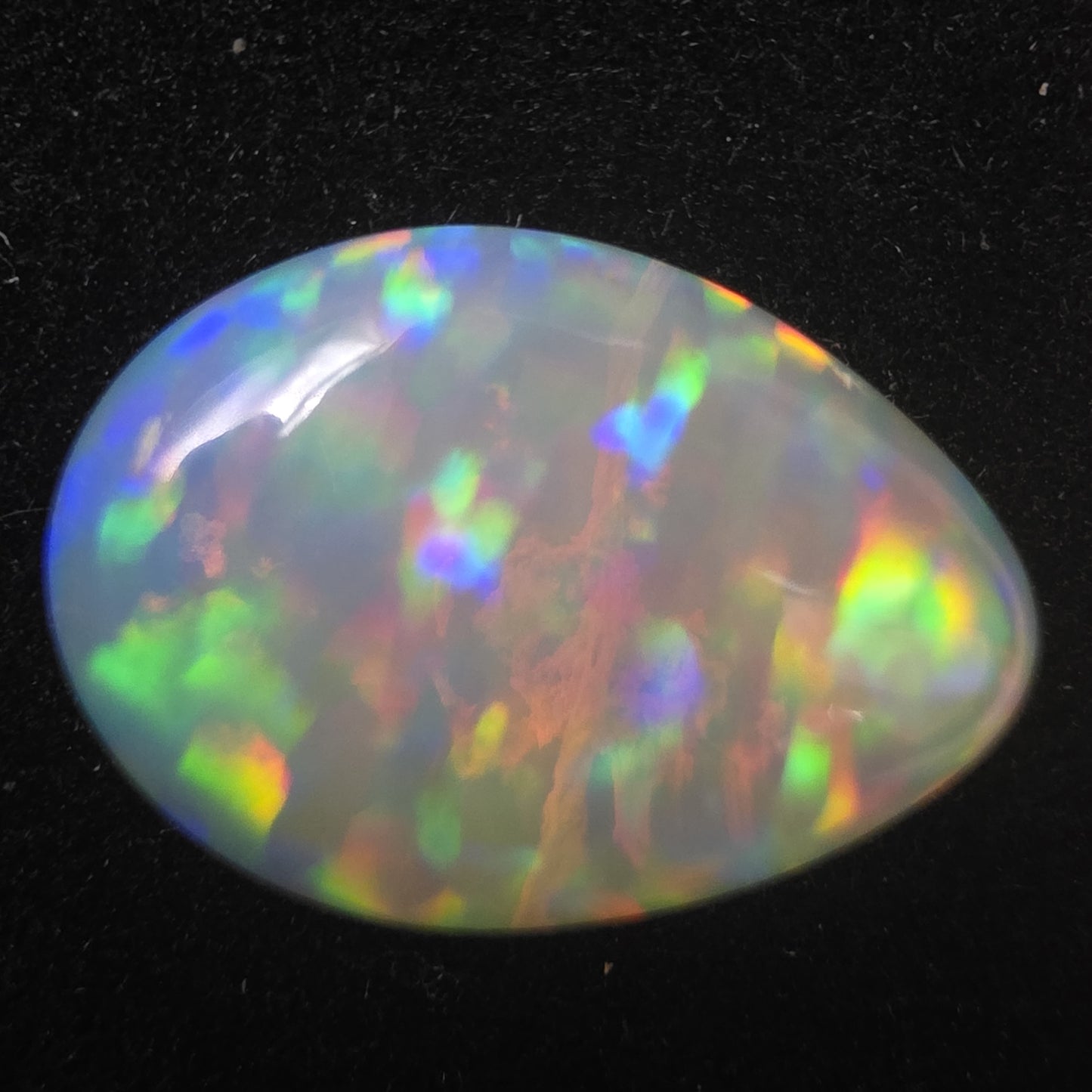 White Opal special Ethiopian Welo, 8.5 ct pear polished, natural, intense Play-of-Colour