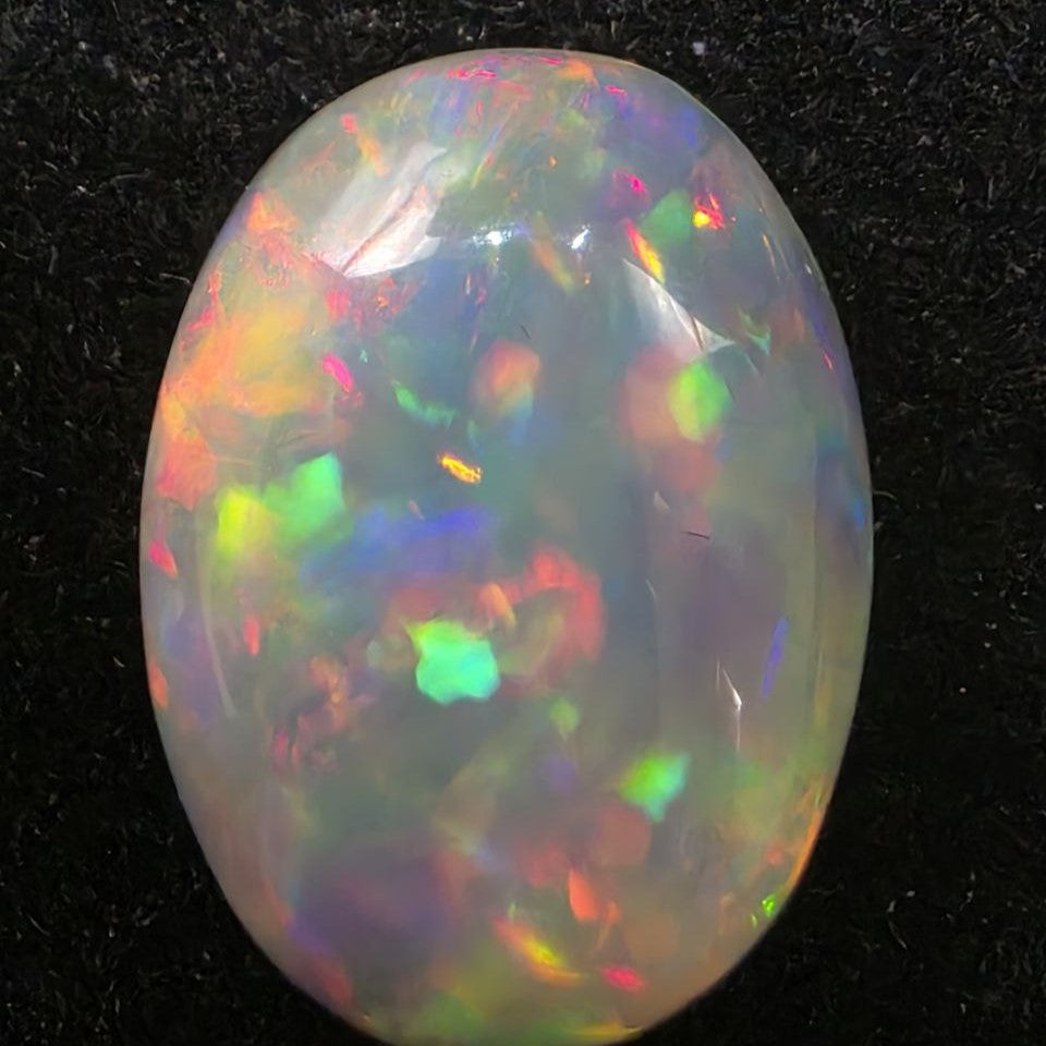 Black Opal special Ethiopian Welo, 6.2 ct oval polished, natural, intense Play-of-Colour