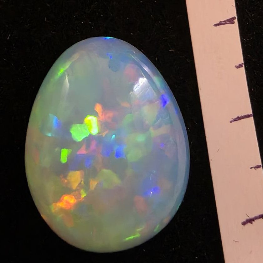 White Opal special Ethiopian Welo, 14.25 ct pear polished, natural, intense Play-of-Colour