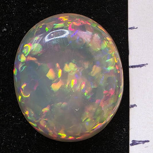 Black Opal special Ethiopian Welo, 6.65 ct oval polished, natural, intense Play-of-Colour