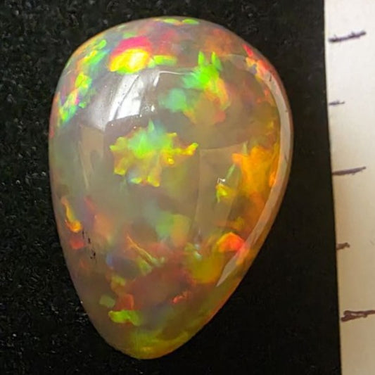 Black Opal special Ethiopian Welo, 23.55 ct pear polished, natural, intense Play-of-Colour