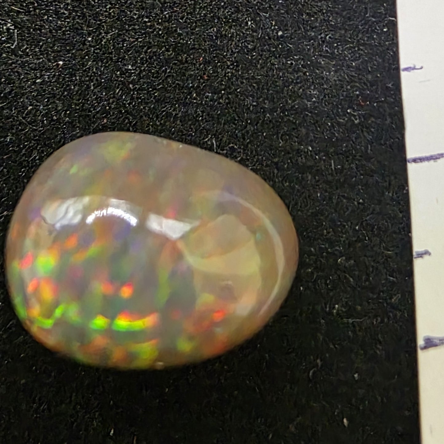 Black Opal special Ethiopian Welo, 7.8 ct pear polished, natural, intense Play-of-Colour