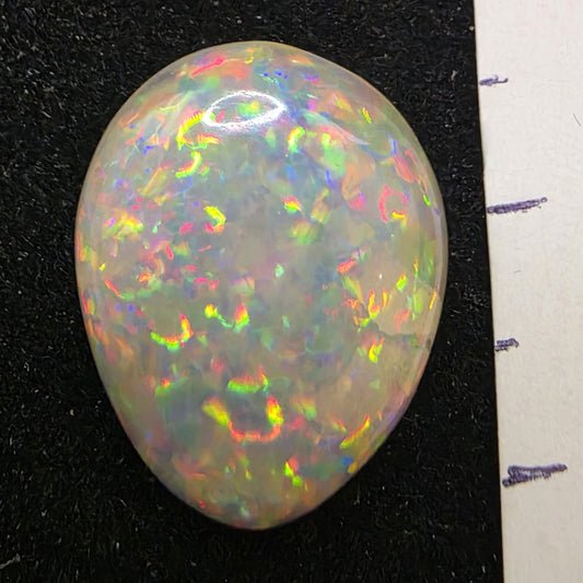 White Opal special Ethiopian Welo, 6.85 ct oval polished, natural, intense Play-of-Colour