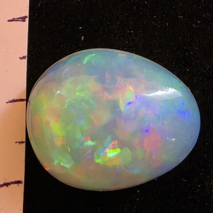 White Opal special Ethiopian Welo, 14.25 ct pear polished, natural, intense Play-of-Colour