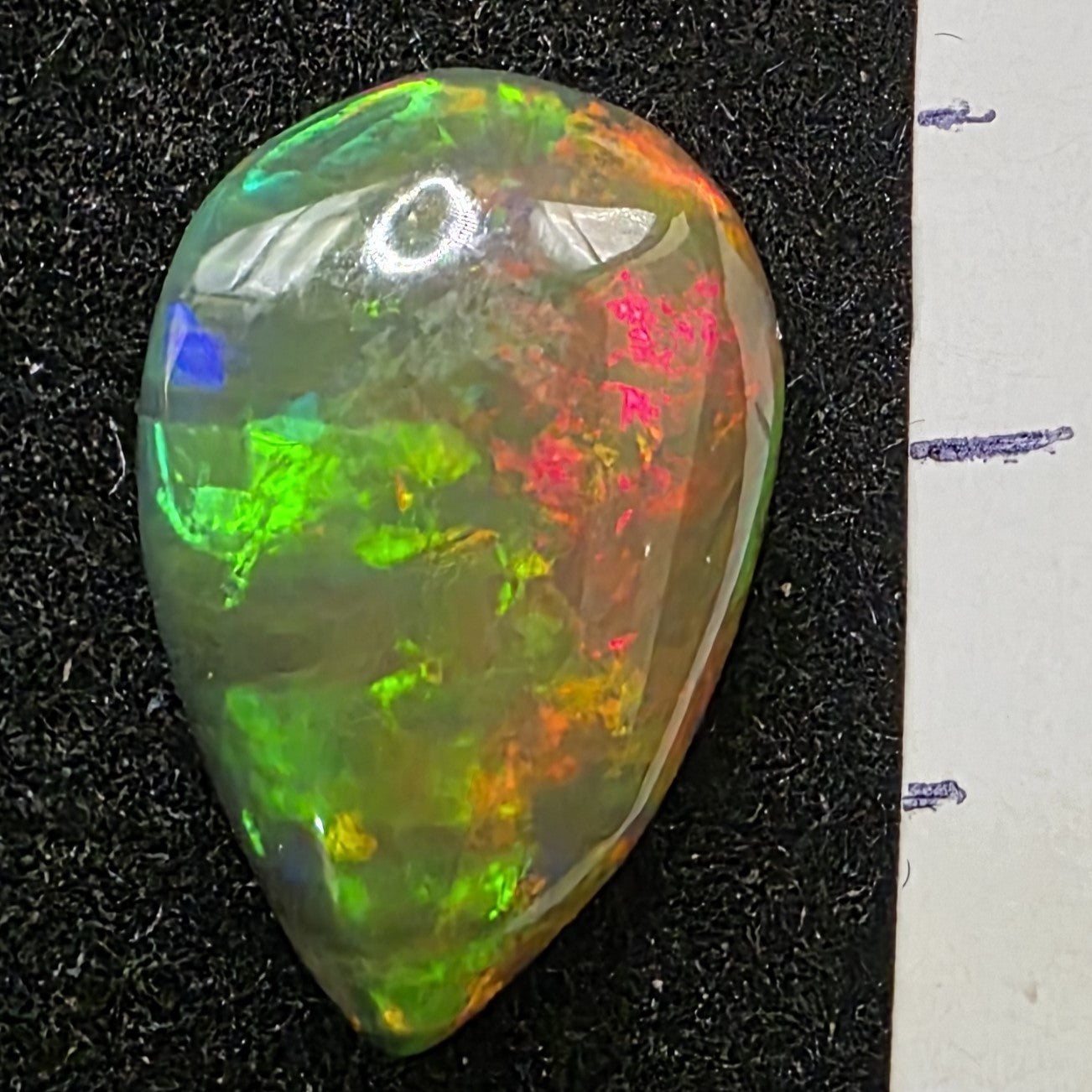 Black Opal special Ethiopian Welo, 3.05 ct pear polished, natural, intense Play-of-Colour