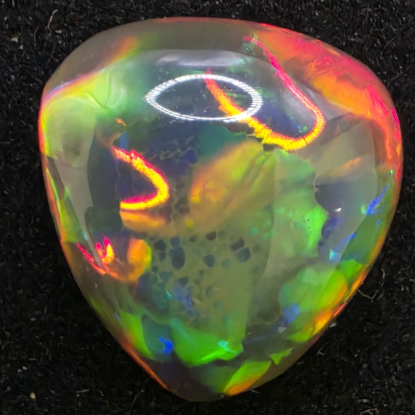 Black Opal special Ethiopian Welo, 4.2 ct pear polished, natural, intense Play-of-Colour