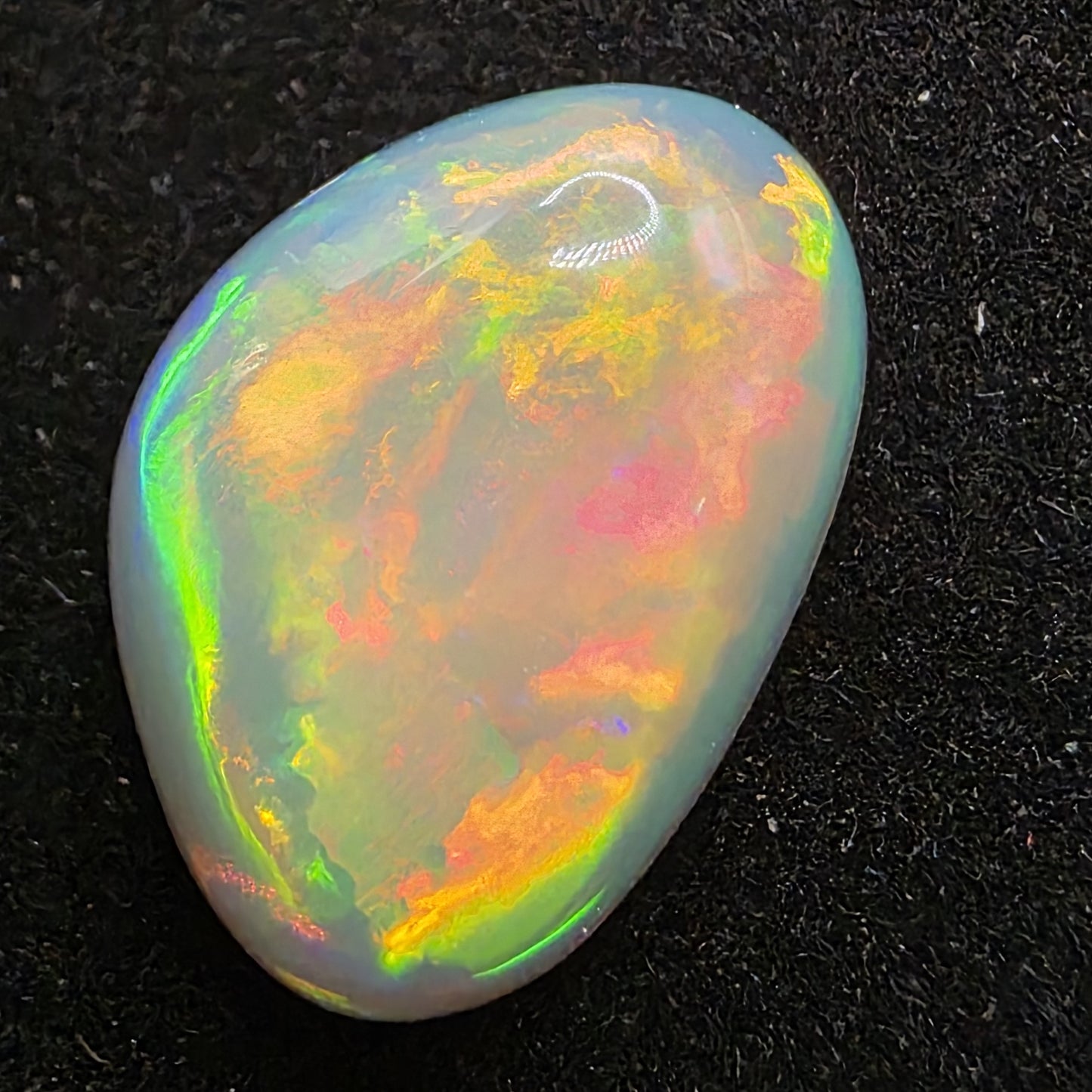 White Opal special Ethiopian Welo, 8.6 ct freeform polished, natural, intense Play-of-Colour