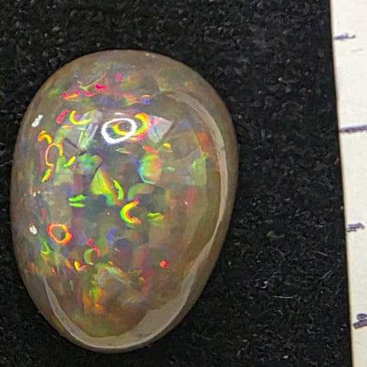 Black Opal special Ethiopian Welo, 7.8 ct pear polished, natural, intense Play-of-Colour