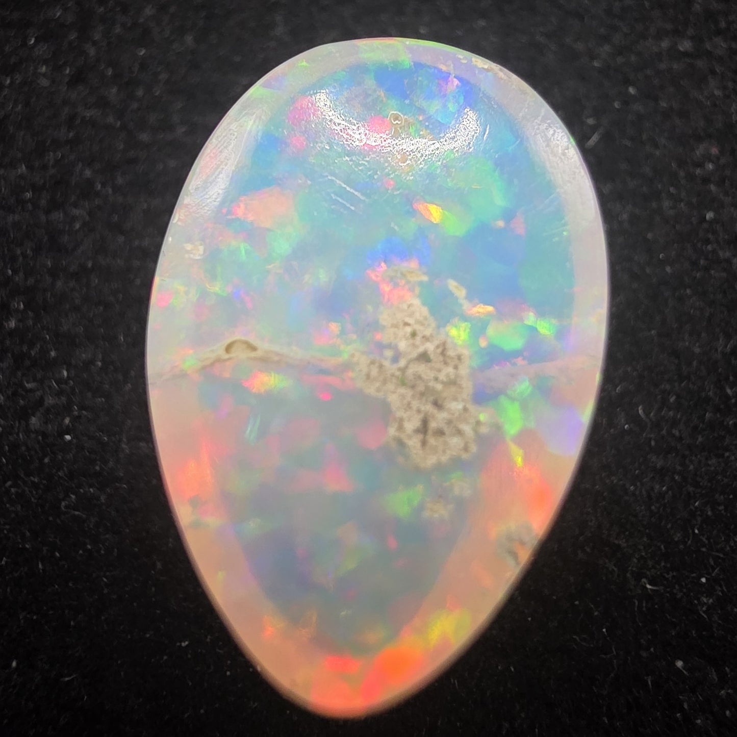 White Opal special Ethiopian Welo, 8.5 ct pear polished, natural, intense Play-of-Colour