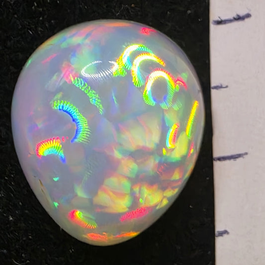 White Opal special Ethiopian Welo, 8.4 ct pear polished, natural, intense Play-of-Colour