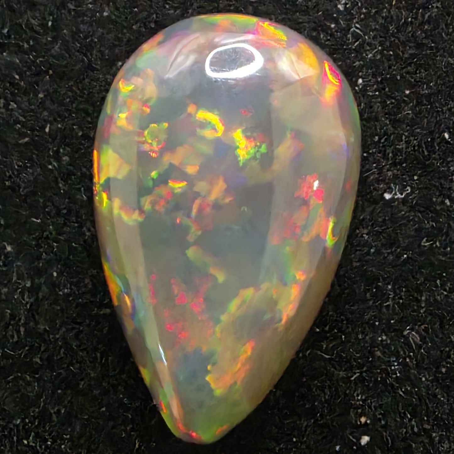 Black Opal special Ethiopian Welo, 3.45 ct pear polished, natural, intense Play-of-Colour