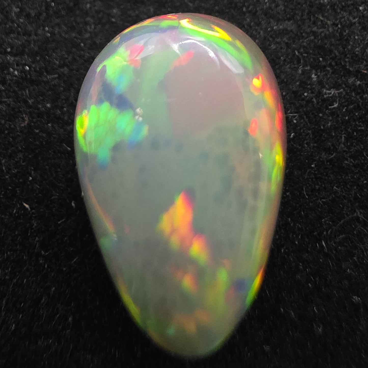 Black Opal special Ethiopian Welo, 4.1 ct pear polished, natural, intense Play-of-Colour