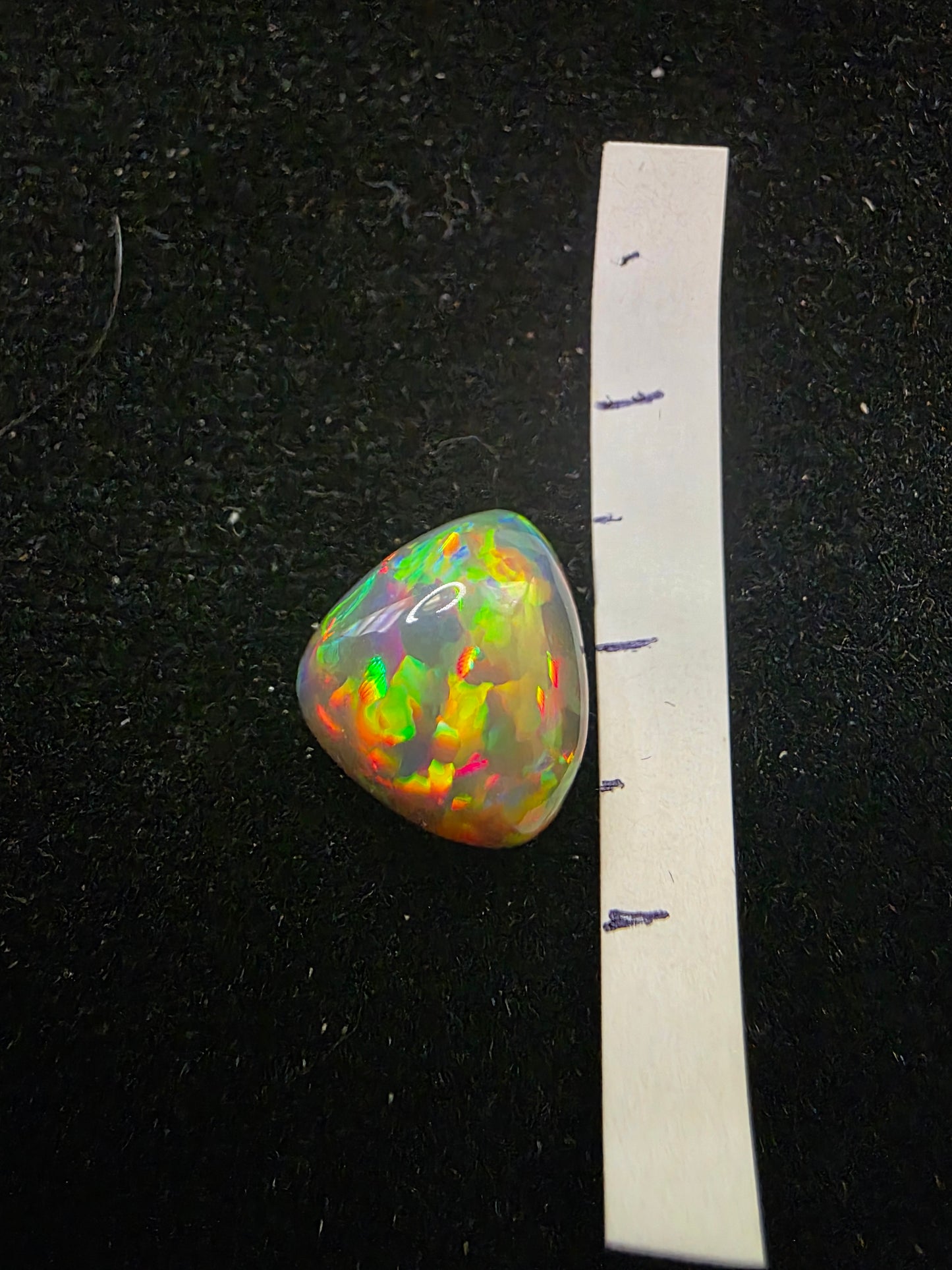 Black Opal special Ethiopian Welo, 4 ct freeform polished, natural, intense Play-of-Colour