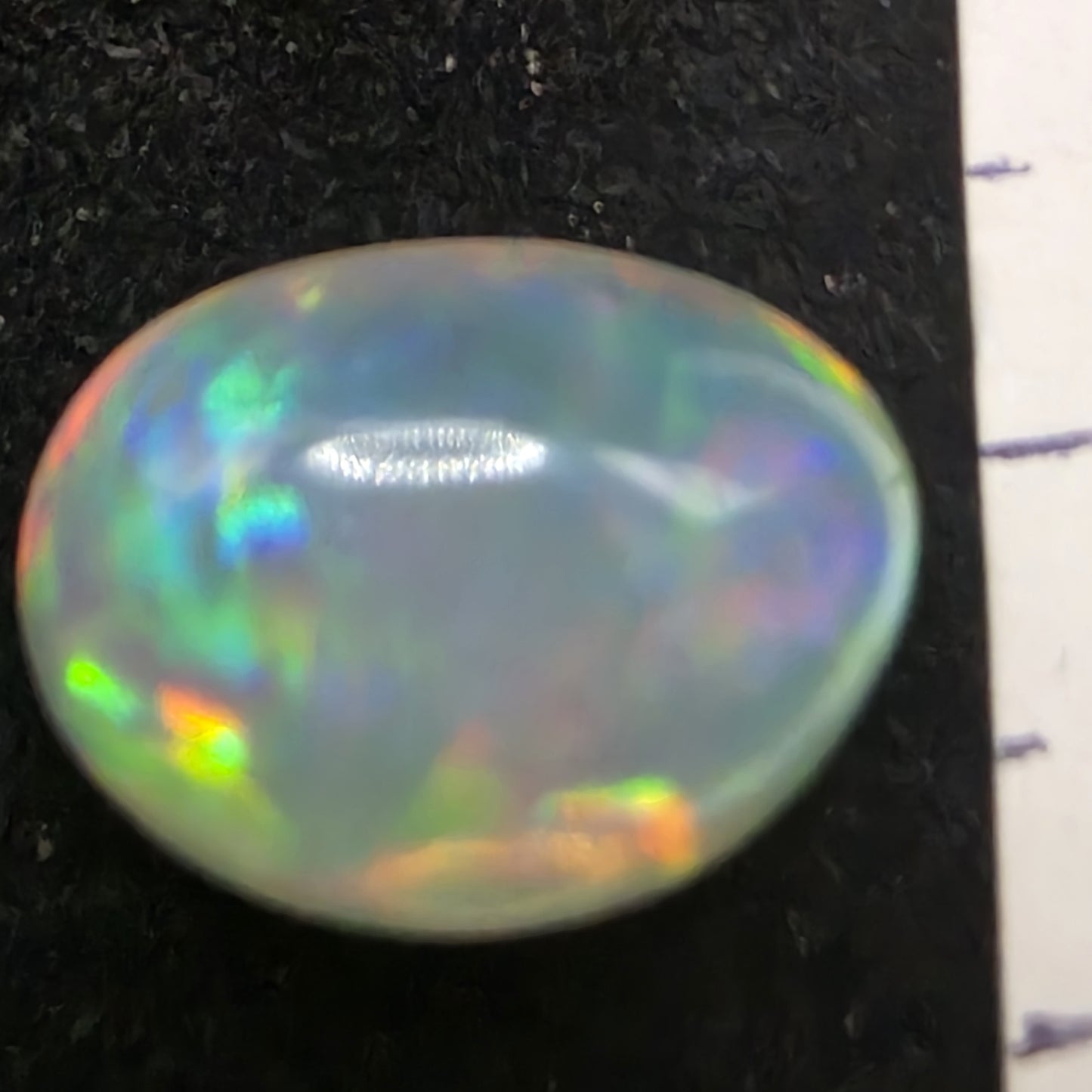 Crystal Opal special Ethiopian Welo, 7.35 ct freeform polished, natural