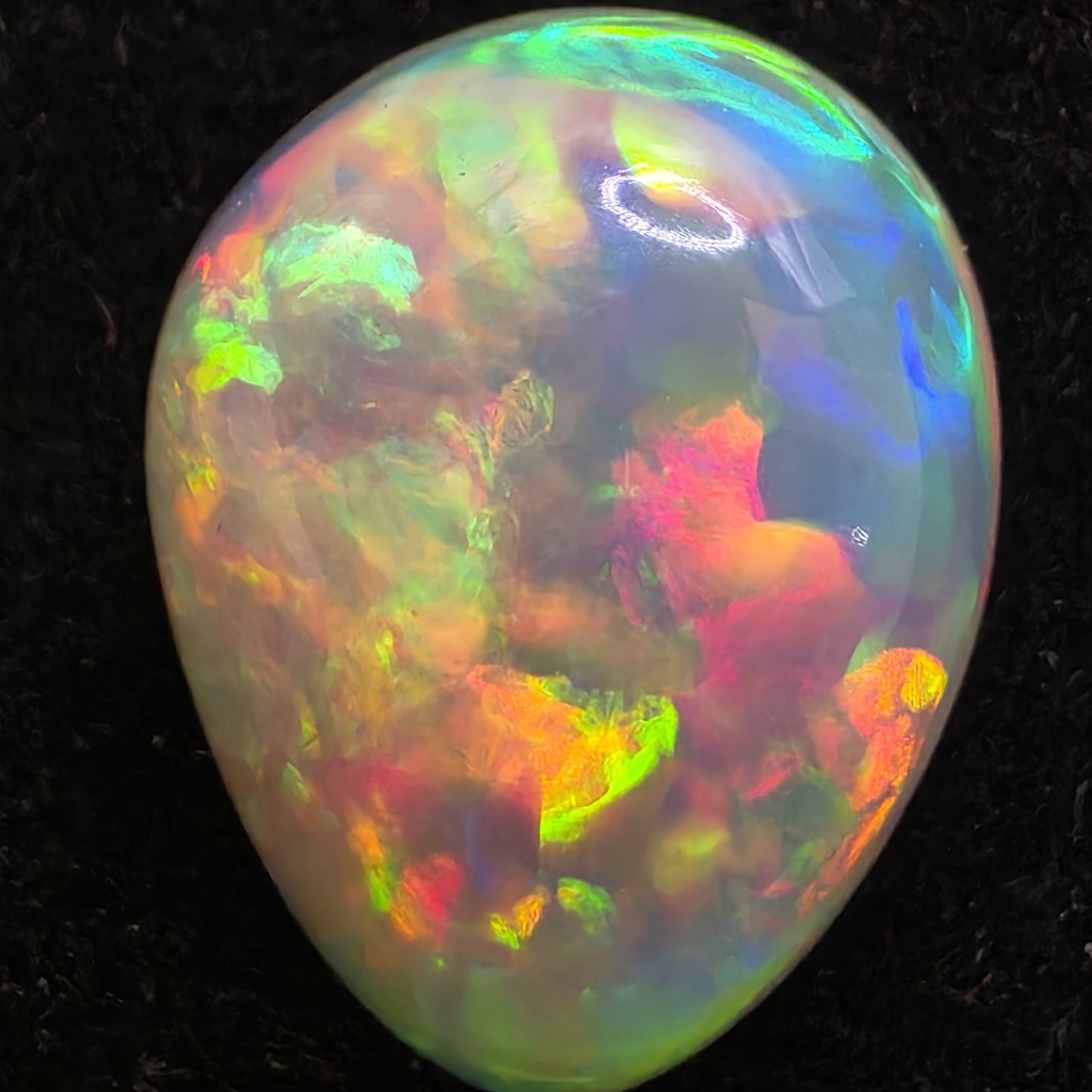 White Opal special Ethiopian Welo, 5.3 ct pear polished, natural, intense Play-of-Colour