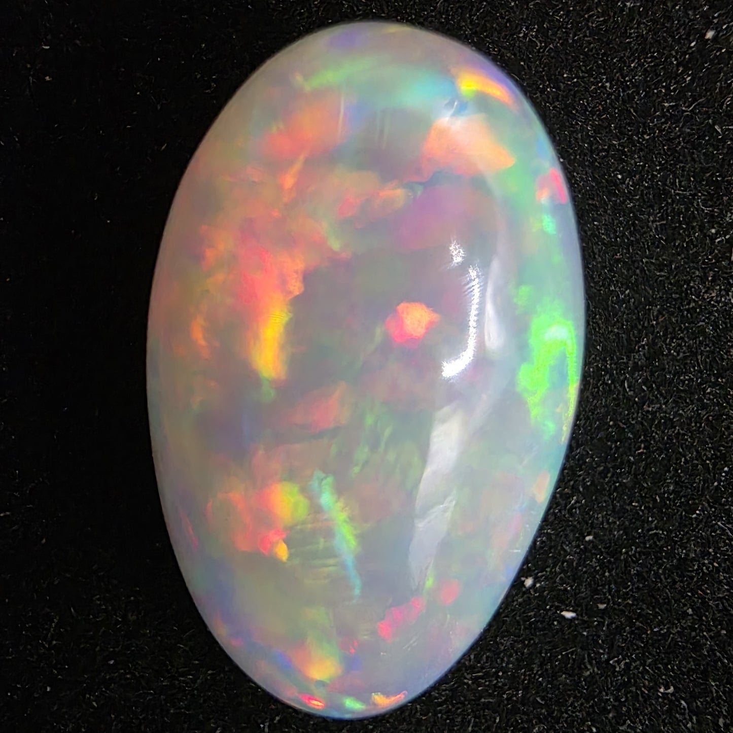 White Opal special Ethiopian Welo, 8.9 ct pear polished, natural, intense Play-of-Colour
