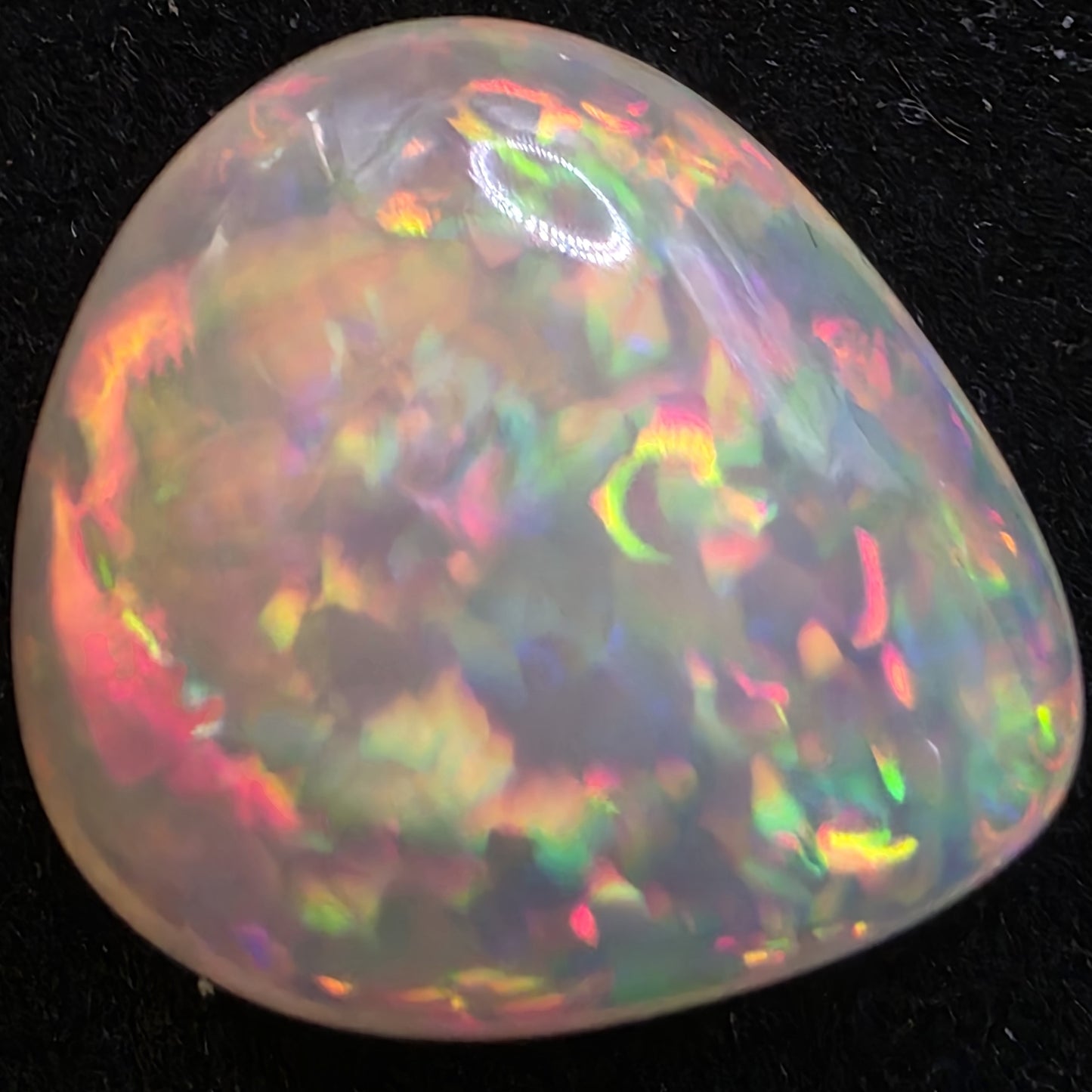 White Opal special Ethiopian Welo, 12.5 ct pear polished, natural, intense Play-of-Colour