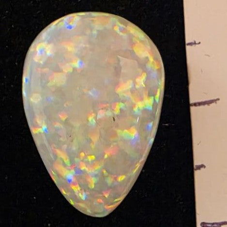 White Opal special Ethiopian Welo, 5.3 ct pear polished, natural, intense Play-of-Colour