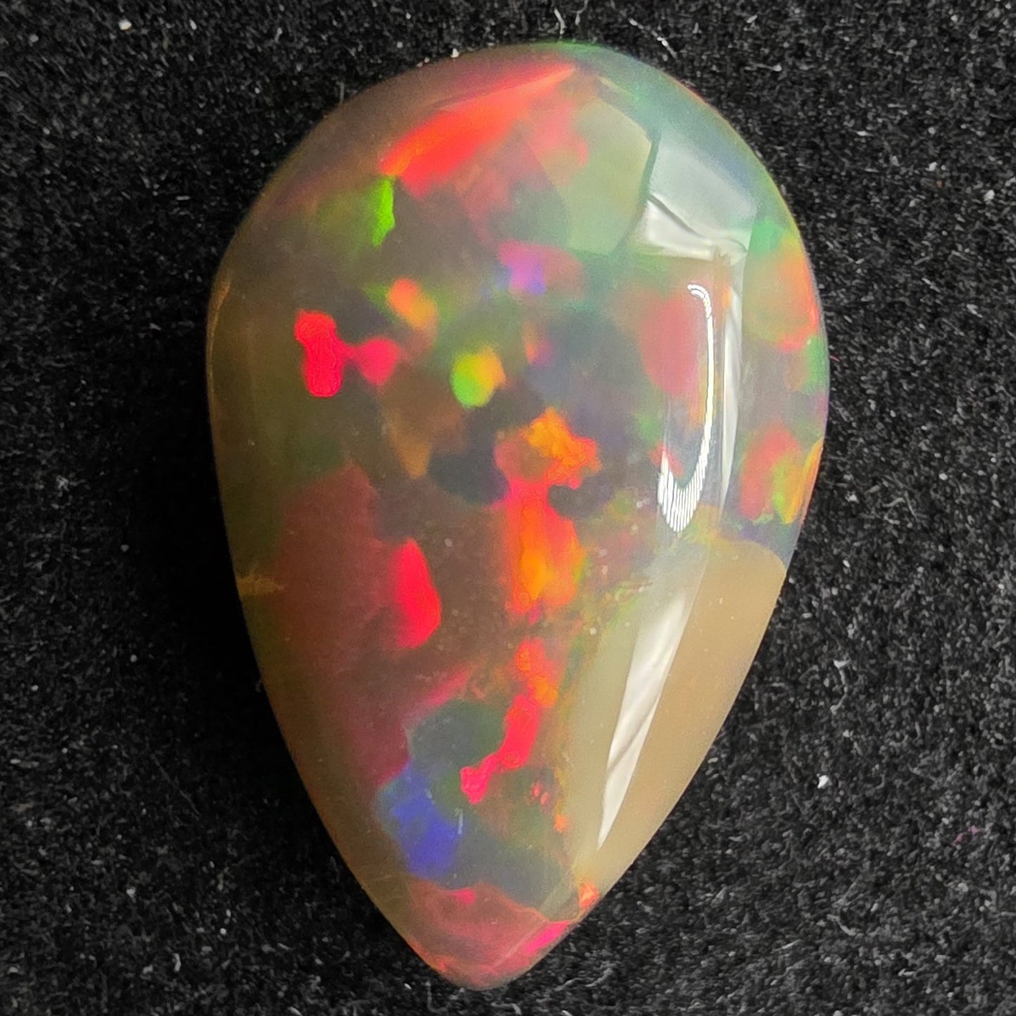 Black Opal special Ethiopian Welo, 2.7 ct pear polished, natural, intense Play-of-Colour