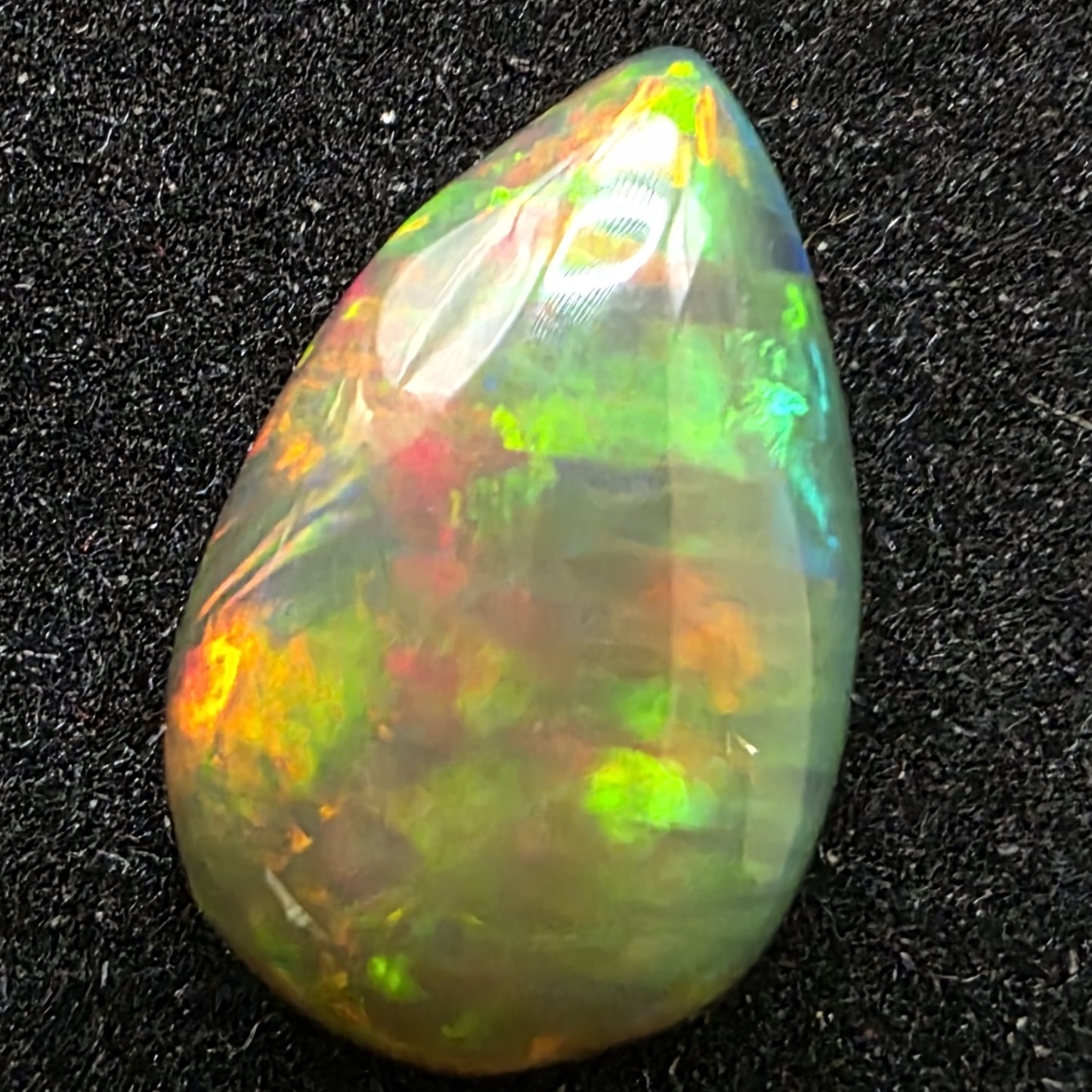Black Opal special Ethiopian Welo, 3.05 ct pear polished, natural, intense Play-of-Colour