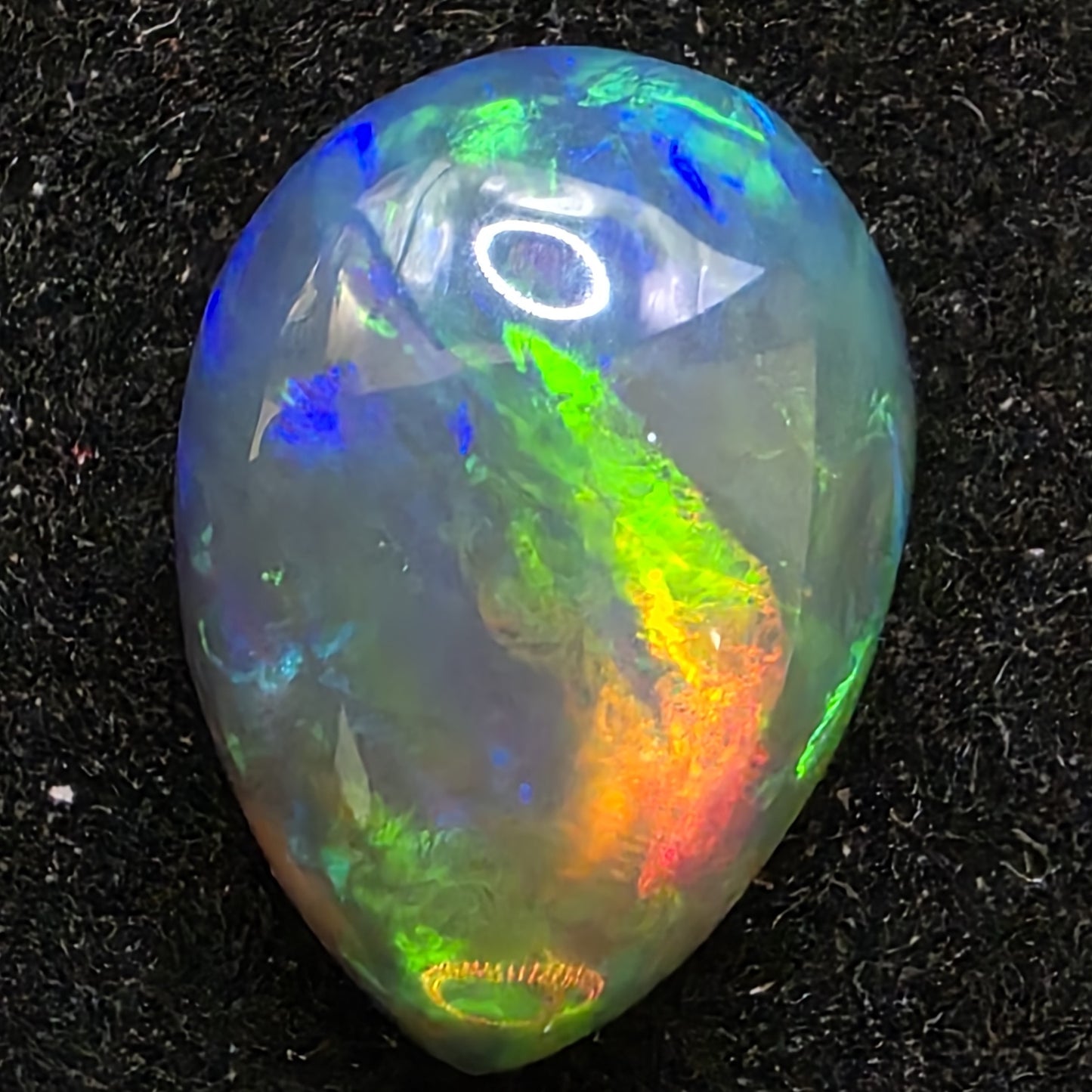 Black Opal special Ethiopian Welo, 3.45 ct pear polished, natural, intense Play-of-Colour