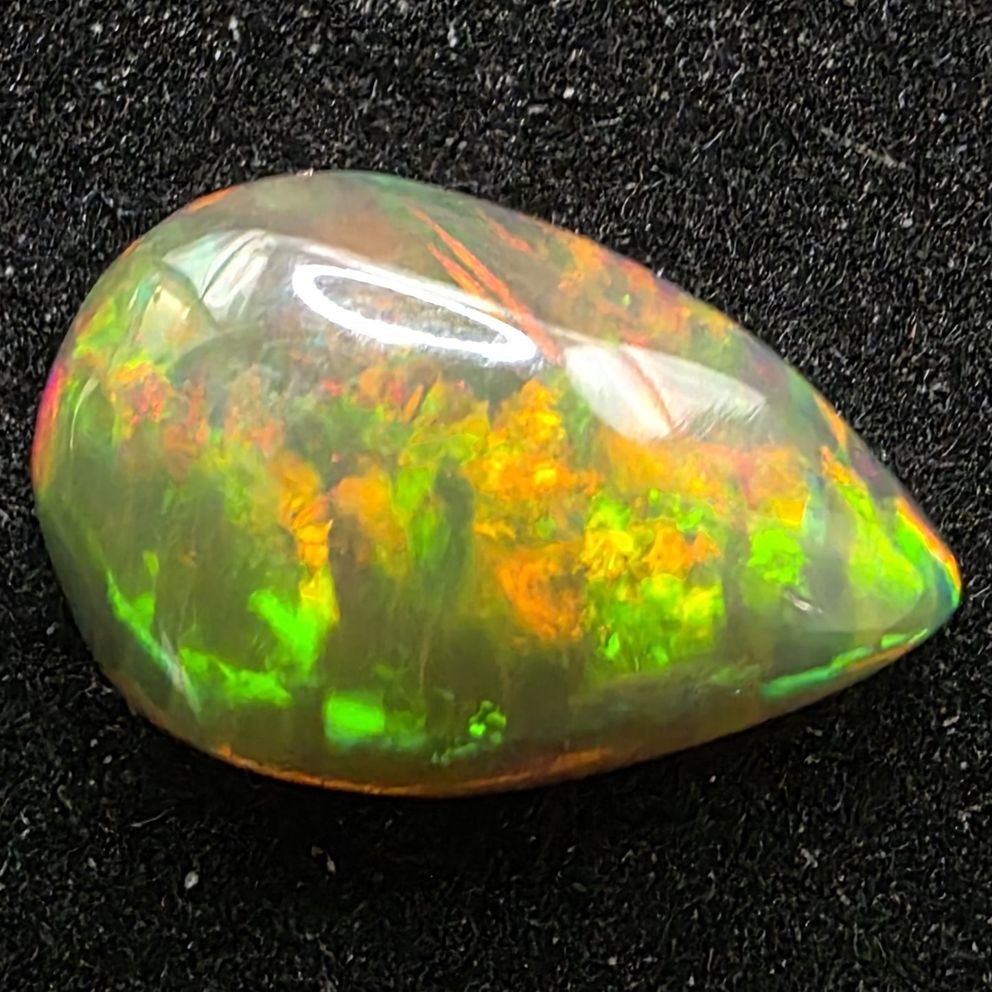 Black Opal special Ethiopian Welo, 3.05 ct pear polished, natural, intense Play-of-Colour