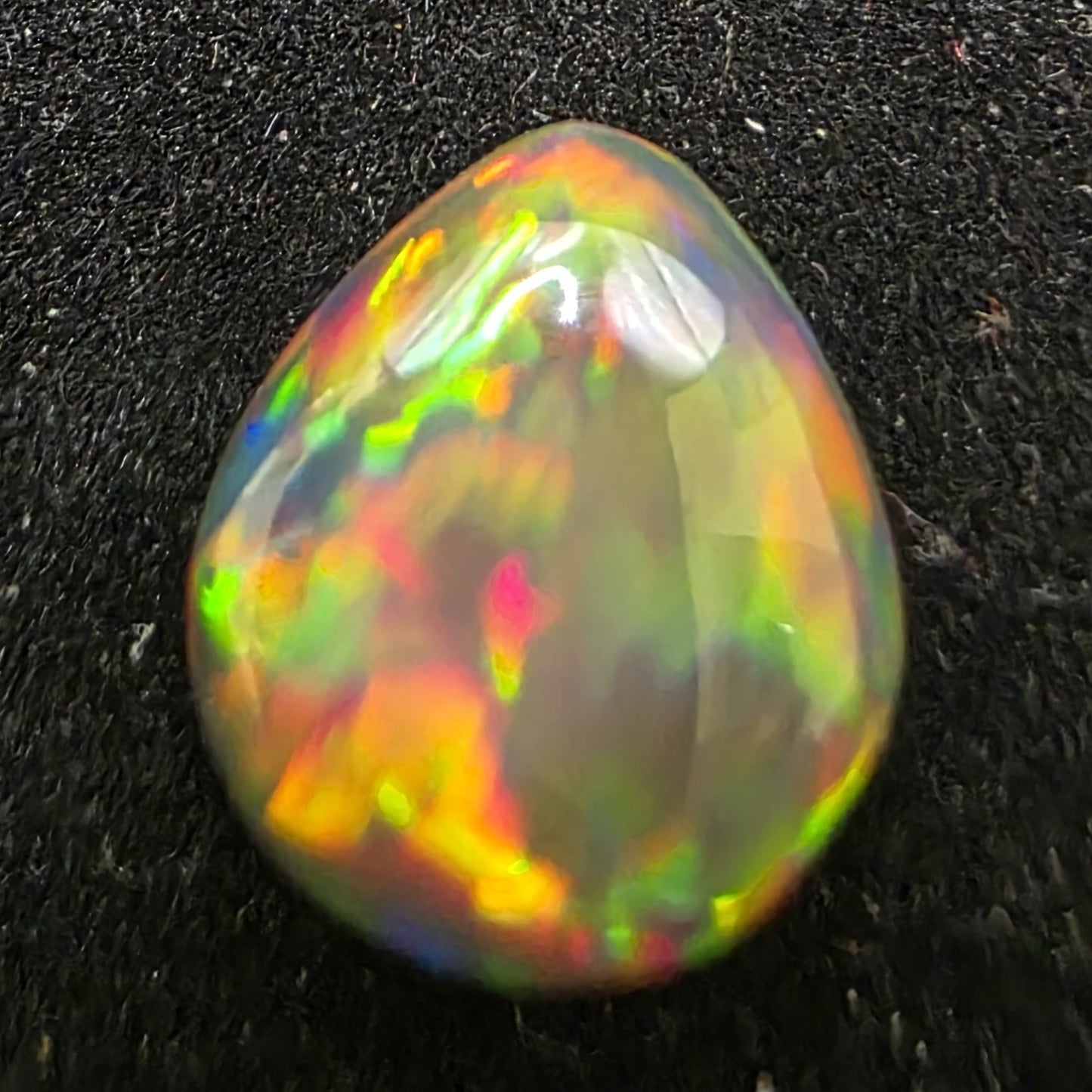Black Opal special Ethiopian Welo, 3.7 ct pear polished, natural, intense Play-of-Colour