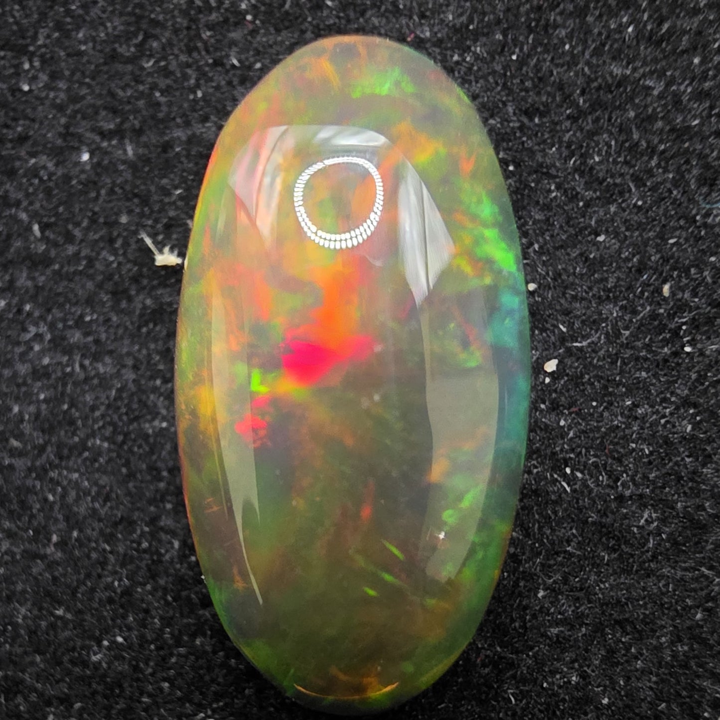 Black Opal special Ethiopian Welo, 4.3 ct oval polished, natural, intense Play-of-Colour