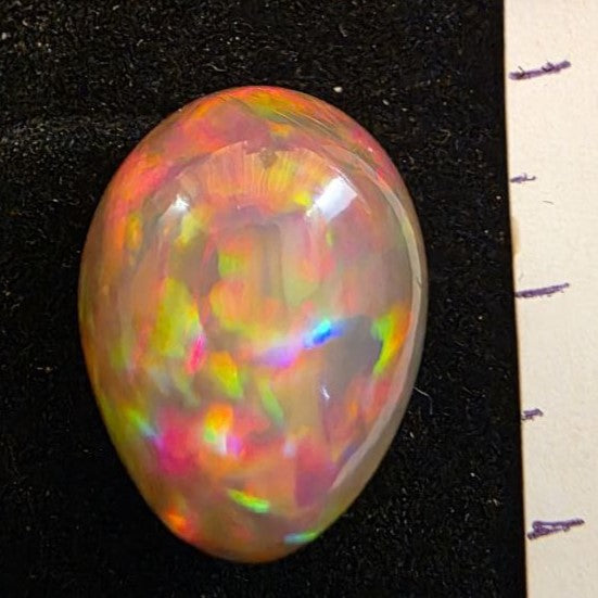 Black Opal special Ethiopian Welo, 14.35 ct pear polished, natural, intense Play-of-Colour