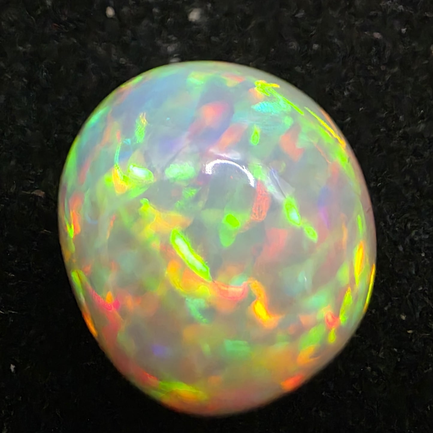 Honeycomb White Opal special Ethiopian Welo, 8.7 ct freeform polished, natural, intense Play-of-Colour