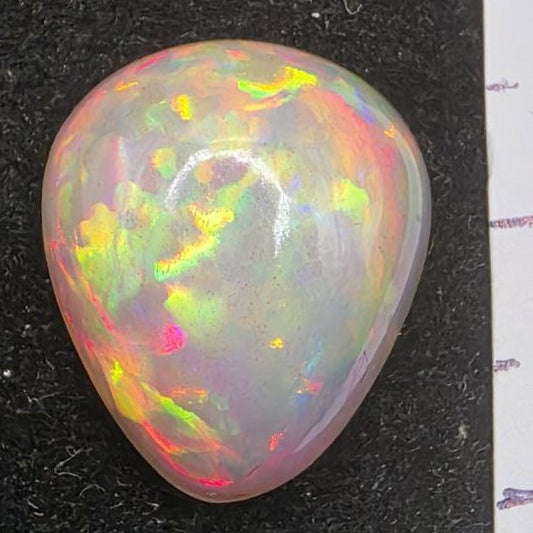 Black Opal special Ethiopian Welo, 8.2 ct pear polished, natural, intense Play-of-Colour