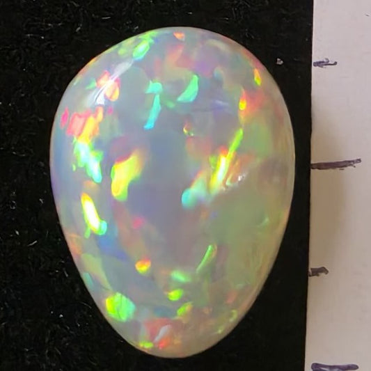 Black Opal special Ethiopian Welo, 4.25 ct pear polished, natural, intense Play-of-Colour