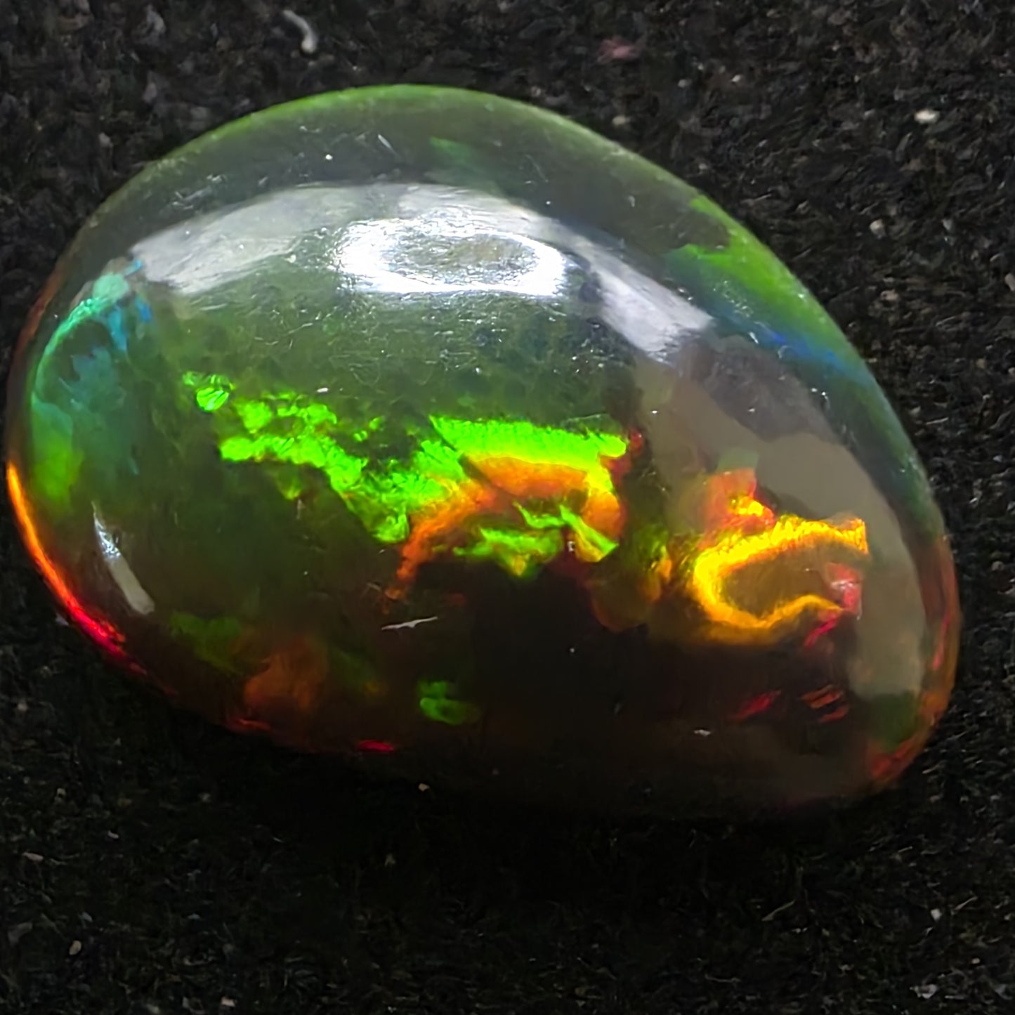 Black Opal special Ethiopian Welo, 5.45 ct freeform polished, natural, intense Play-of-Colour