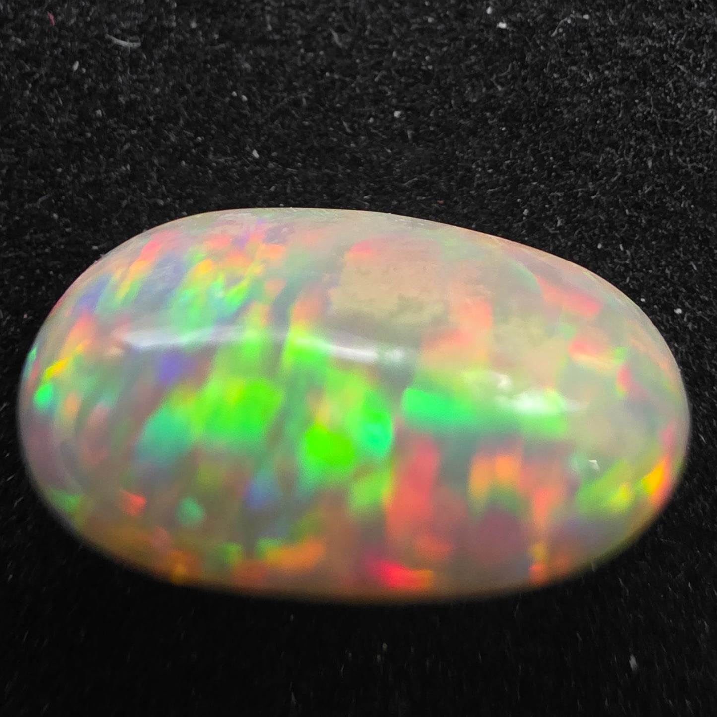 Black Opal special Ethiopian Welo, 4.7 ct oval polished, natural, intense Play-of-Colour