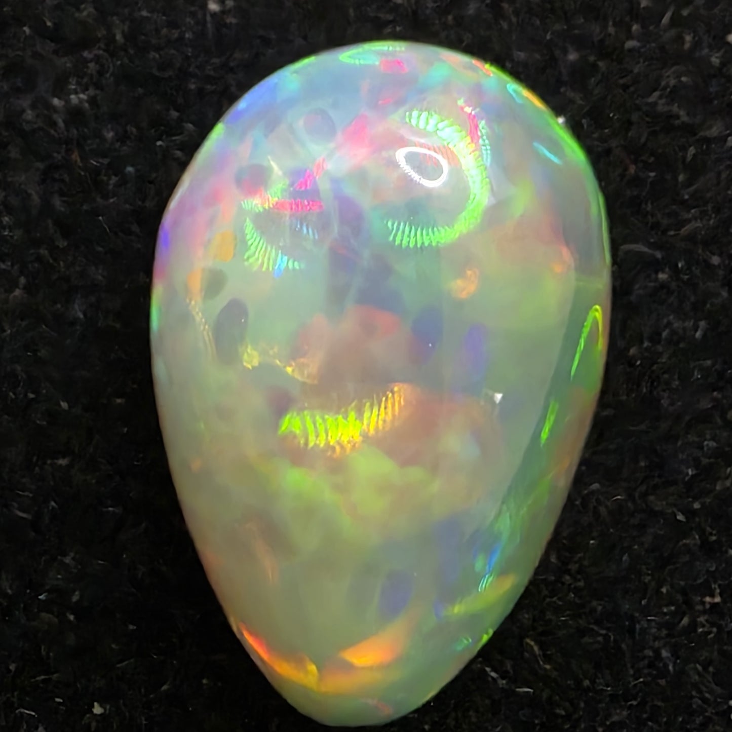 Black Opal special Ethiopian Welo, 4.55 ct pear polished, natural, intense Play-of-Colour