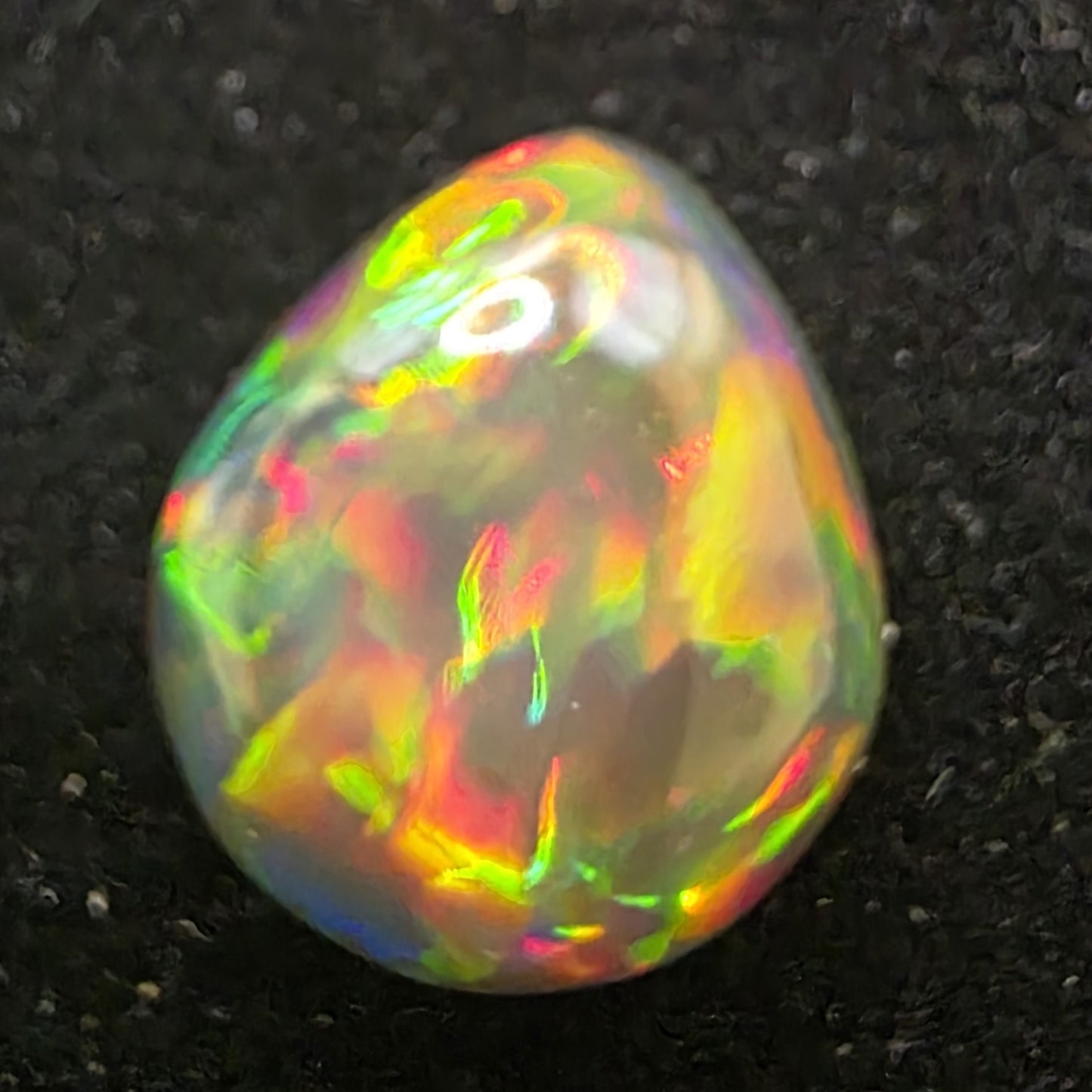 Black Opal special Ethiopian Welo, 3.7 ct pear polished, natural, intense Play-of-Colour