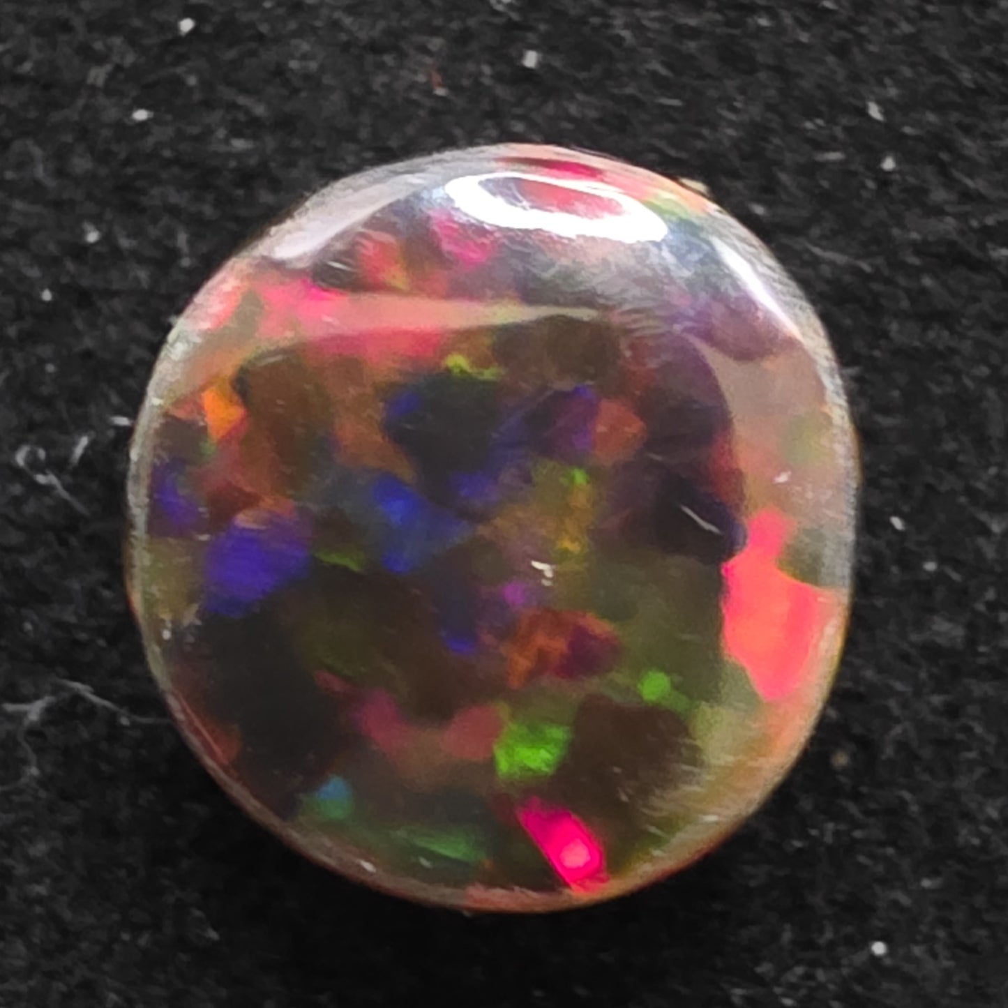 Black Opal special Ethiopian Welo, 2.45 ct freeform polished, natural, intense Play-of-Colour