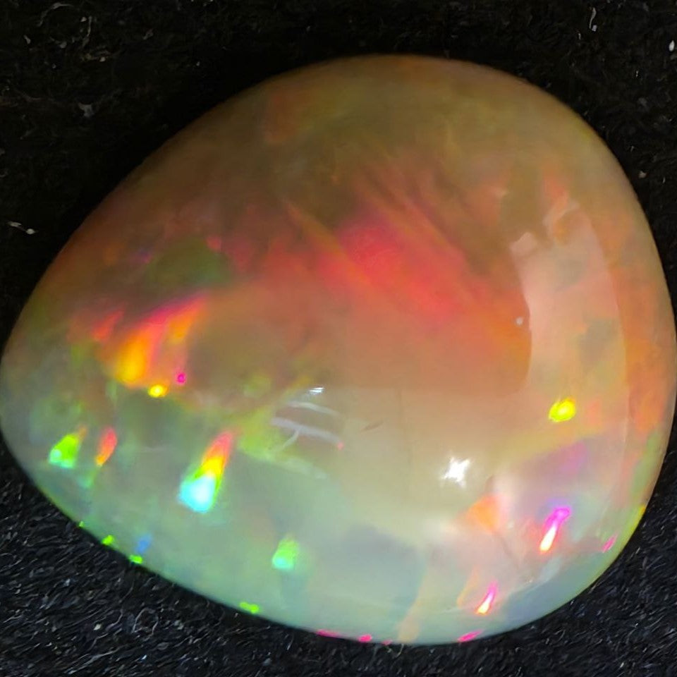 Black Opal special Ethiopian Welo, 12.25 ct pear polished, natural