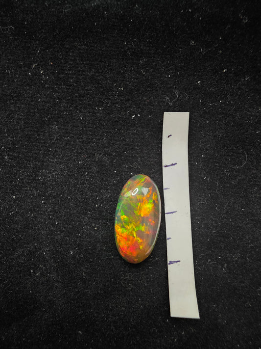 Black Opal special Ethiopian Welo, 4.3 ct oval polished, natural, intense Play-of-Colour