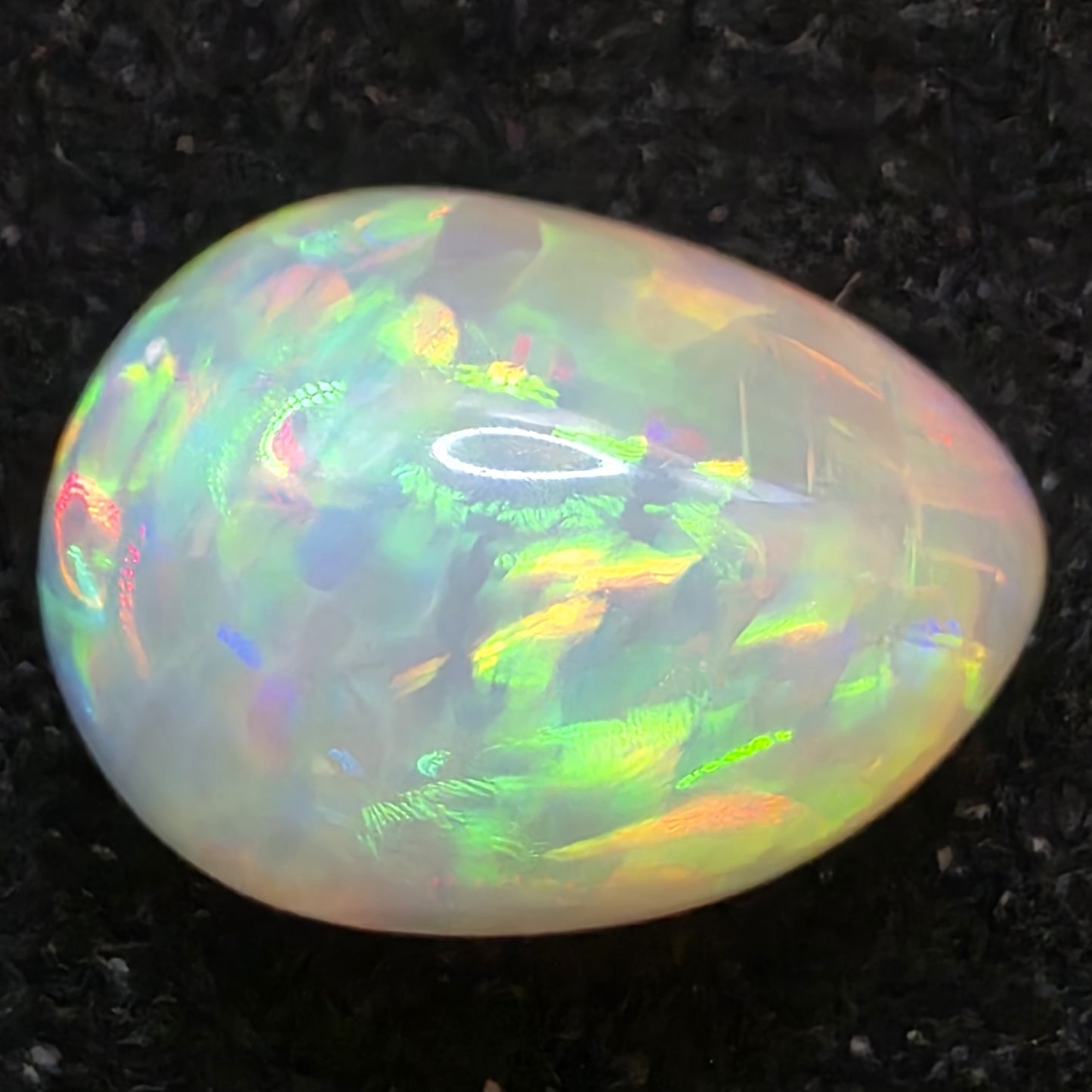 White Opal special Ethiopian Welo, 6.7 ct freeform polished, natural, intense Play-of-Colour