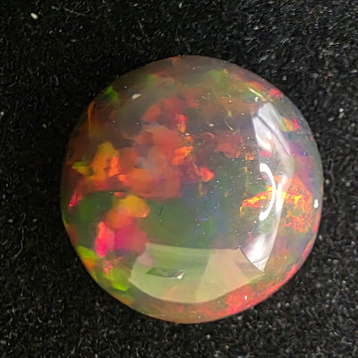 Black Opal special Ethiopian Welo, 4.25 ct round polished, natural, intense Play-of-Colour