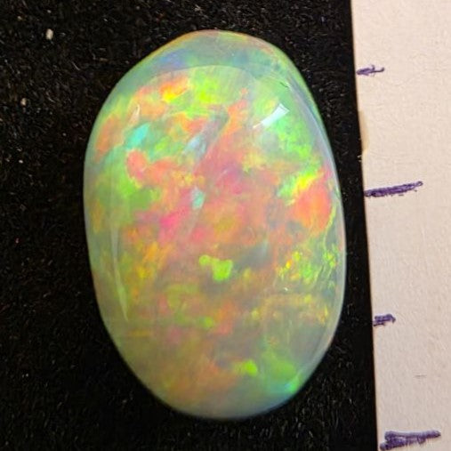 Black Opal special Ethiopian Welo, 5 ct oval polished, natural, intense Play-of-Colour