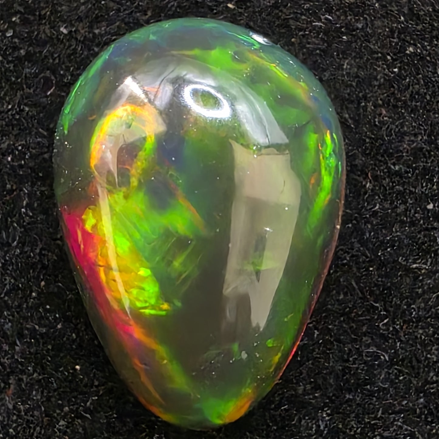 Black Opal special Ethiopian Welo, 3.95 ct pear polished, natural, intense Play-of-Colour