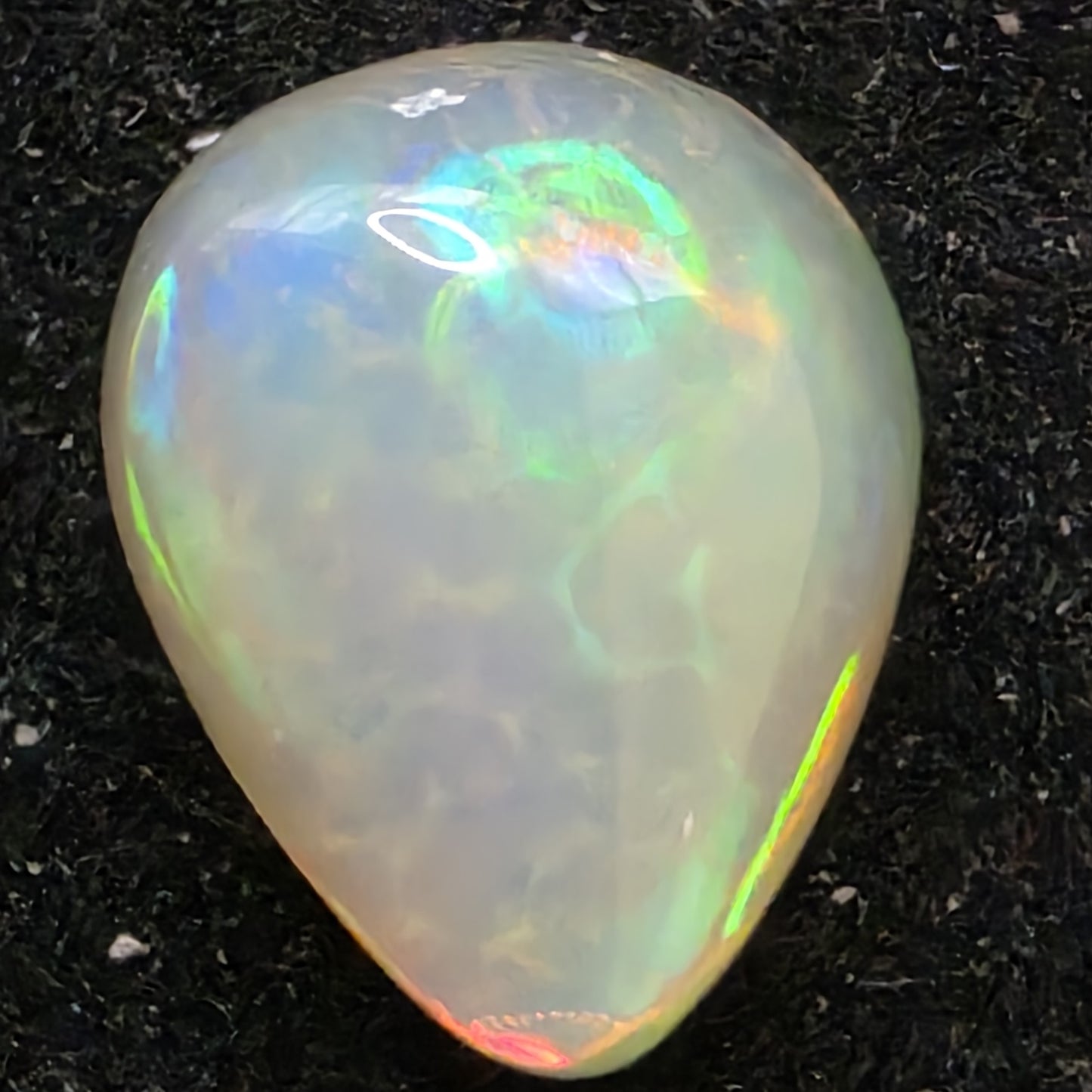 White Opal special Ethiopian Welo, 2.75 ct pear polished, natural, intense Play-of-Colour