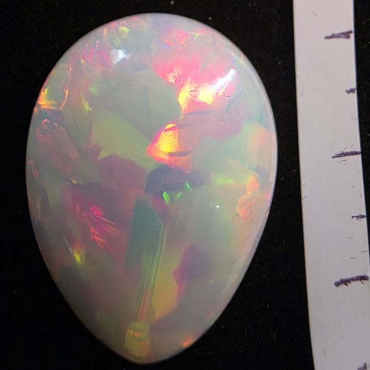 White Opal special Ethiopian Welo, 22.9 ct pear polished, natural, intense Play-of-Colour