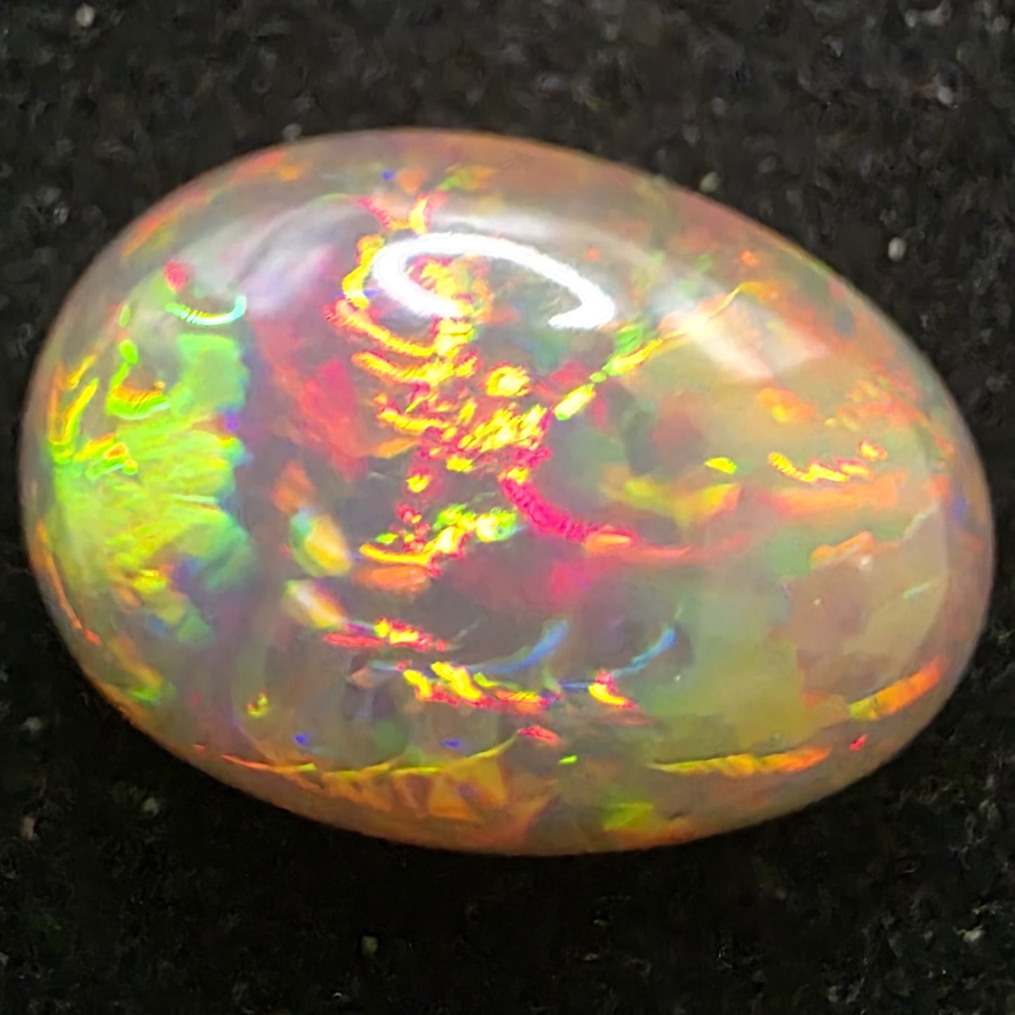Black Opal special Ethiopian Welo, 5.35 ct oval polished, natural, intense Play-of-Colour